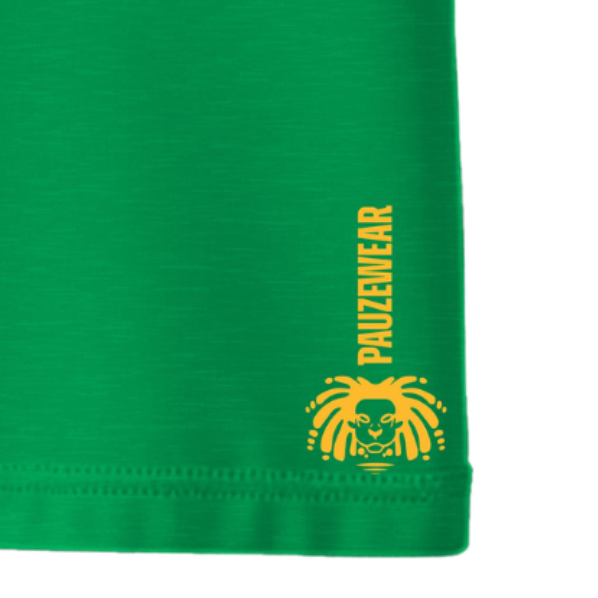 Green T-shirt hem with yellow 'PAUZEWEAR' logo on a white background