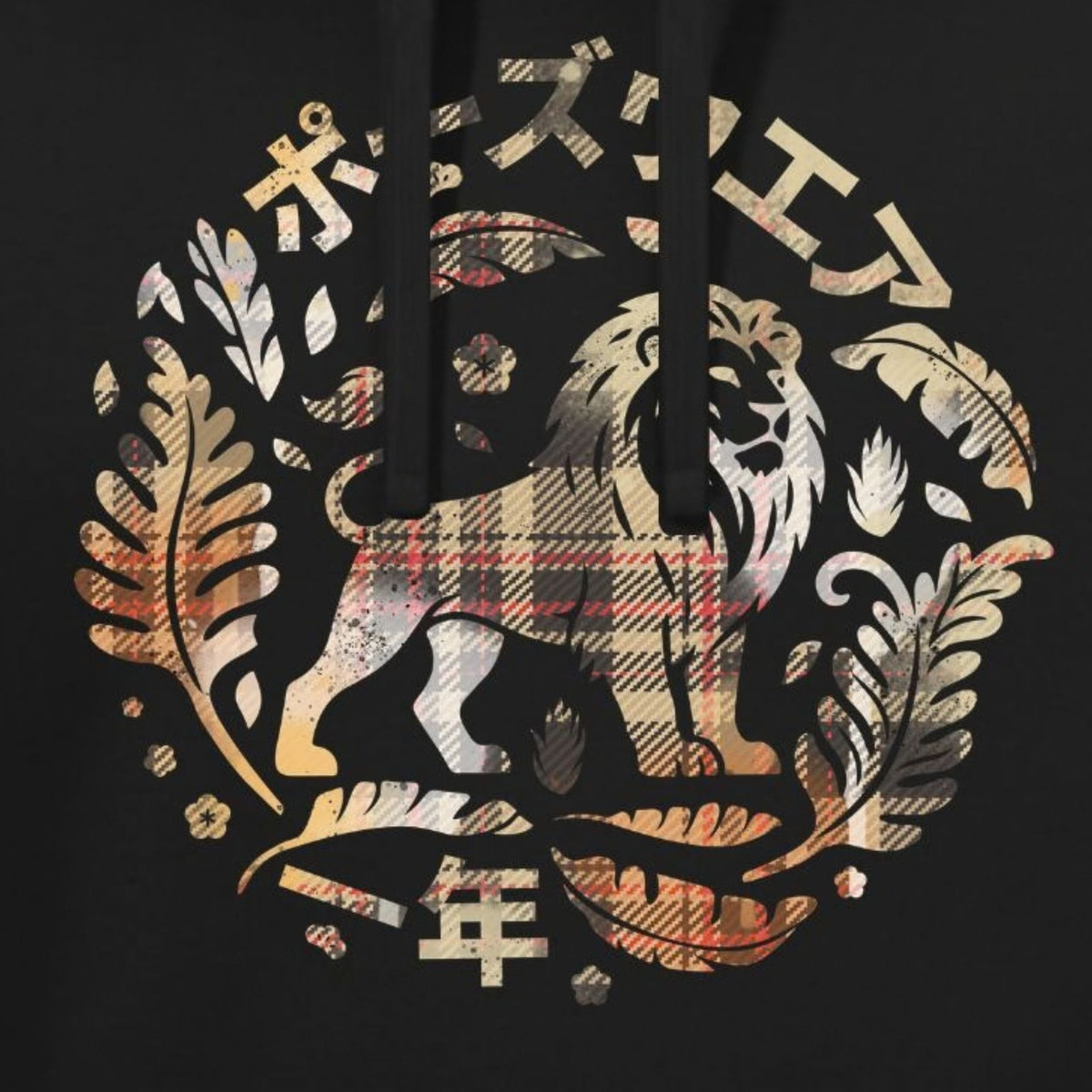 Close-up of a black hoodie featuring a large front graphic with a lion, ornate leaves, Japanese text, and a plaid pattern in beige, gold, and muted red tones.