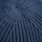 Close-up of a textured blue fabric surface