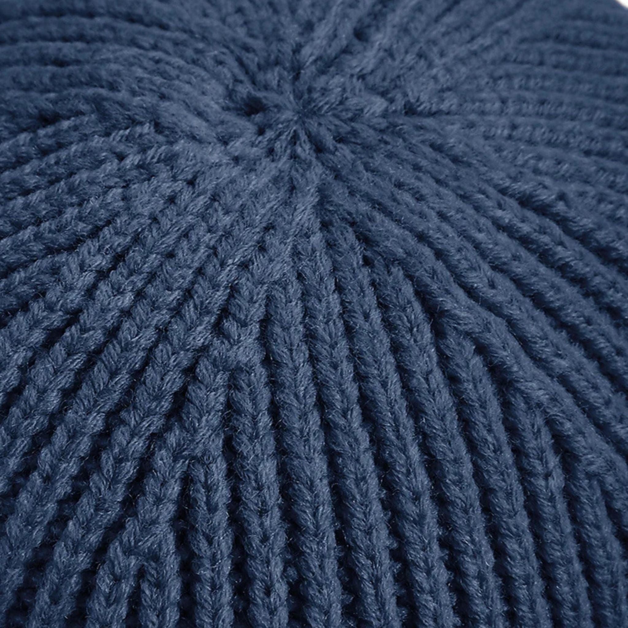 Close-up of a textured blue fabric surface