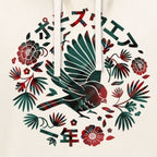 A close-up of a hoodie featuring a circular graphic print with a bird, flowers, leaves, and Japanese characters on an off-white fabric.